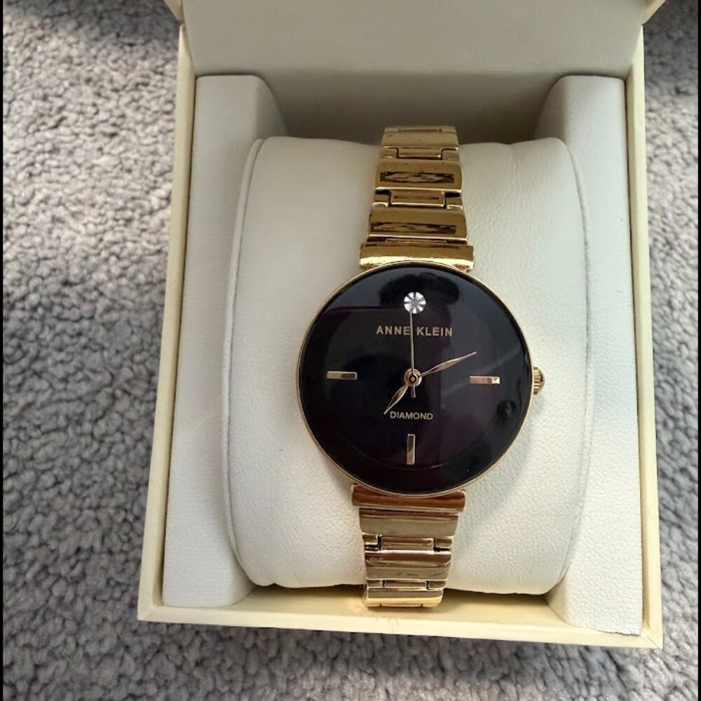 Anne Klein Women's AK-2434BKGB genuine diamond dial gold-tone and black